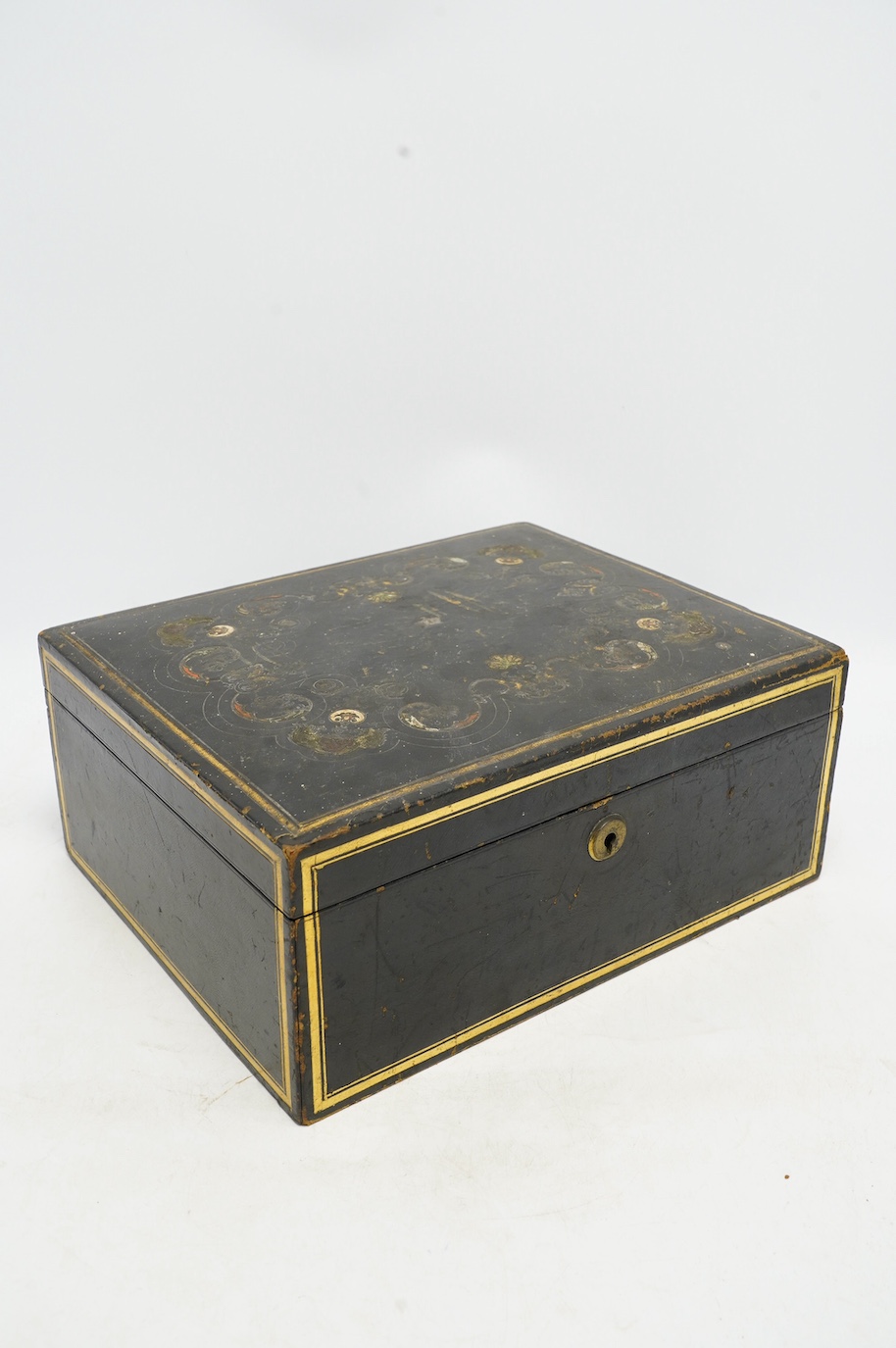 A Victorian black Moroccan leather paper lined and fitted writing box, with some implements, 30cm x 12.5cm. Condition - fair